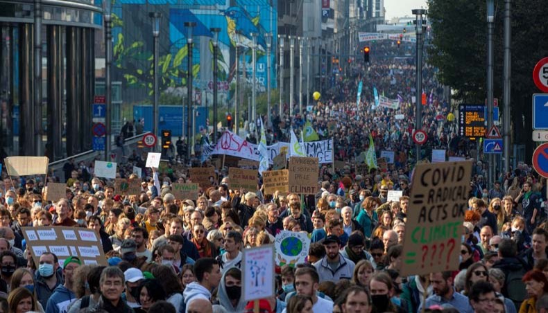 New Age | Tens of thousands of protesters rally in Belgium climate march