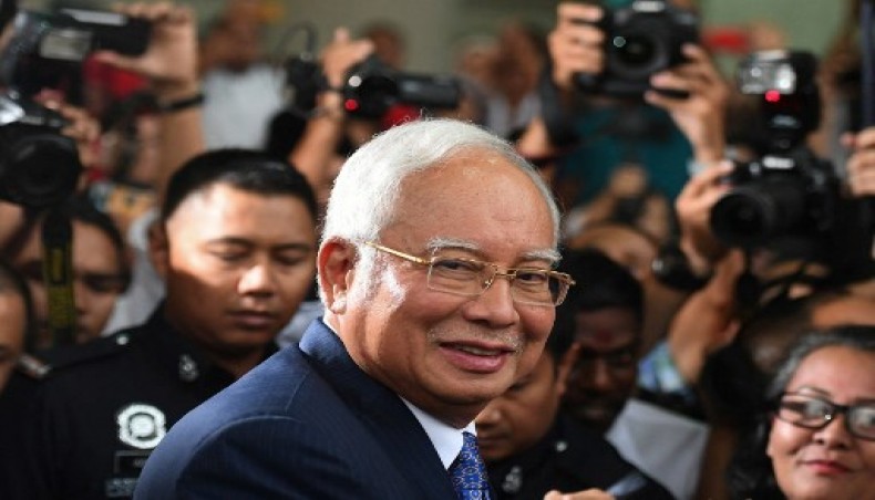 New Age | Malaysia’s ex-PM Najib Razak jail term halved to six years